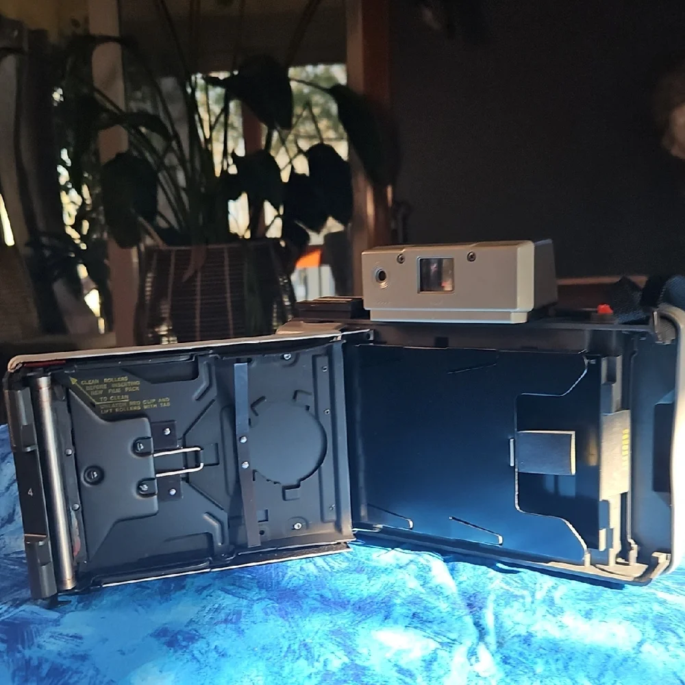 Polaroid Box with Navy Blue and Yellow Lettering